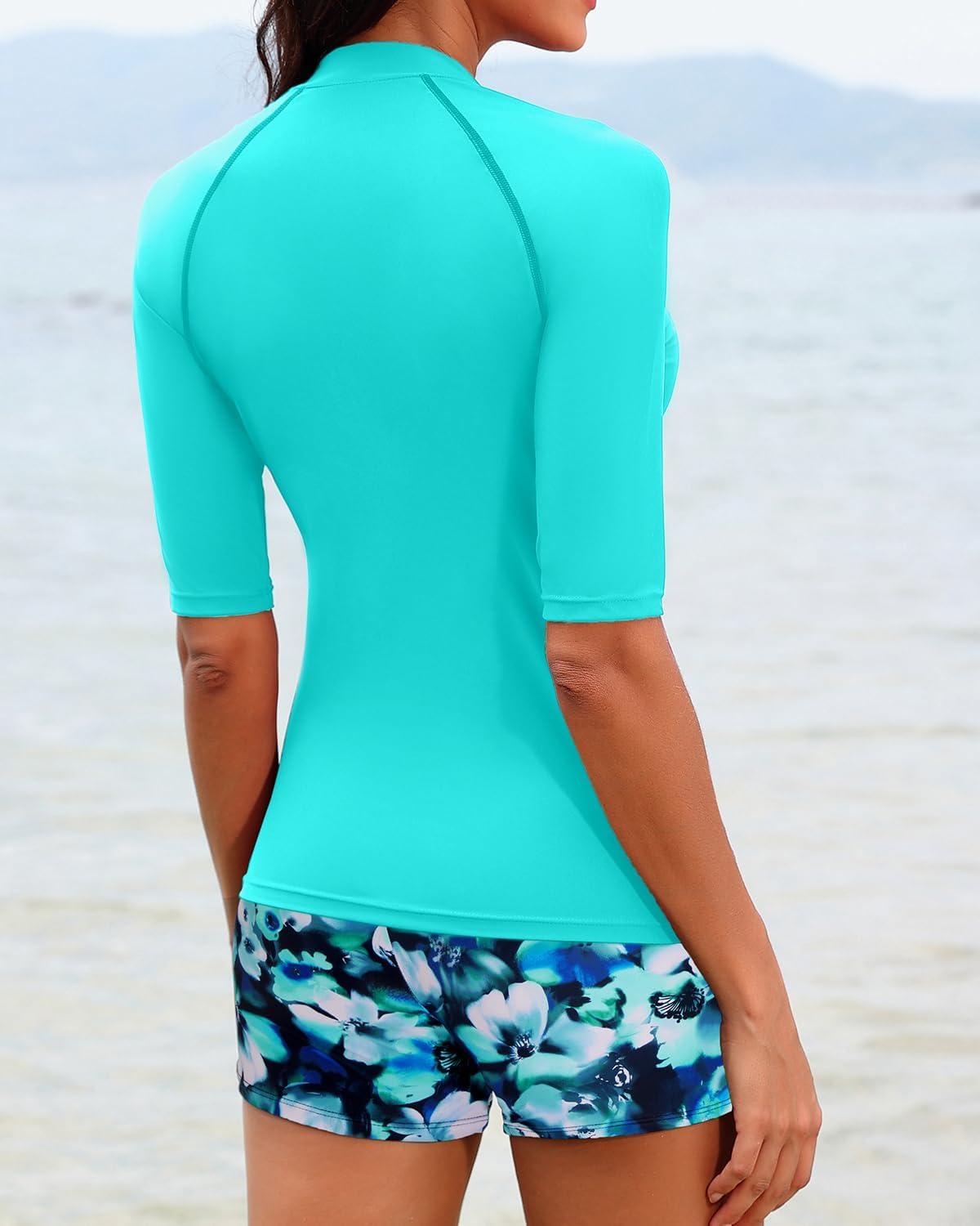 imageHolipick Women 2 Piece Rash Guard SwimsuitShort Sleeve Swim Shirt with Shorts Full Zipper SPF Modest SwimwearAqua Floral