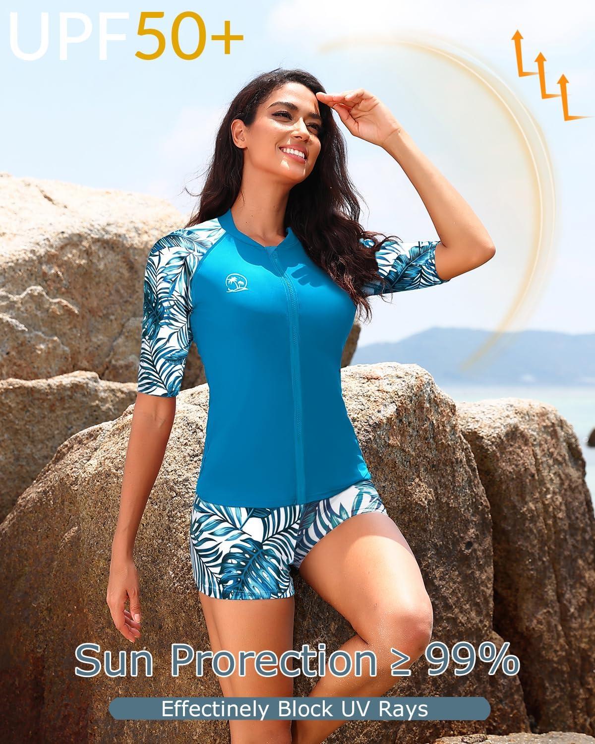 imageHolipick Women 2 Piece Rash Guard SwimsuitShort Sleeve Swim Shirt with Shorts Full Zipper SPF Modest SwimwearBlue Leaves